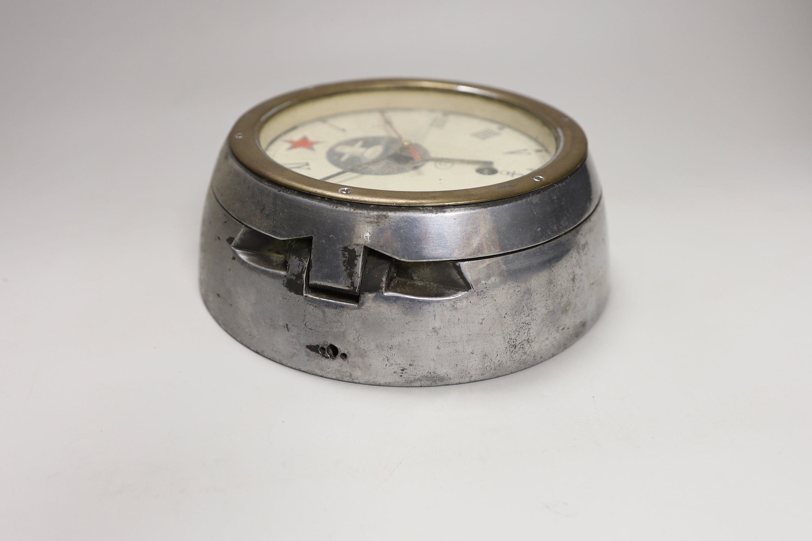 A Russian submariners bulkhead timepiece, mechanical movement over-wound, diameter 21cm